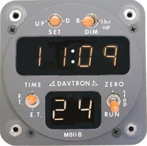 CHRONOMETER/M811 Digital clock. Displays universal time, local time and flight time, 24 hour LT, 2 1/4 internal mount, 6 digit display, gray face plate.